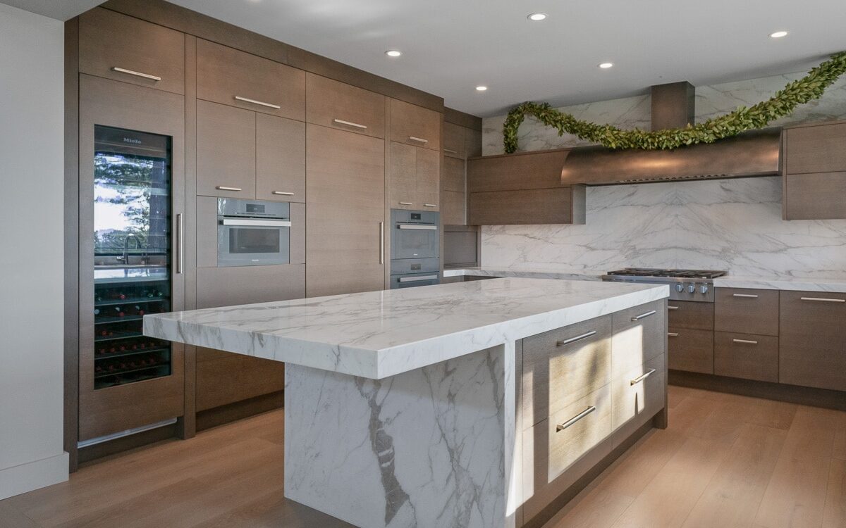 Pebble Beach_New Construction_Kitchen_Remodel_Bronze_Riftcut_Oak_Cabinet_Marble island